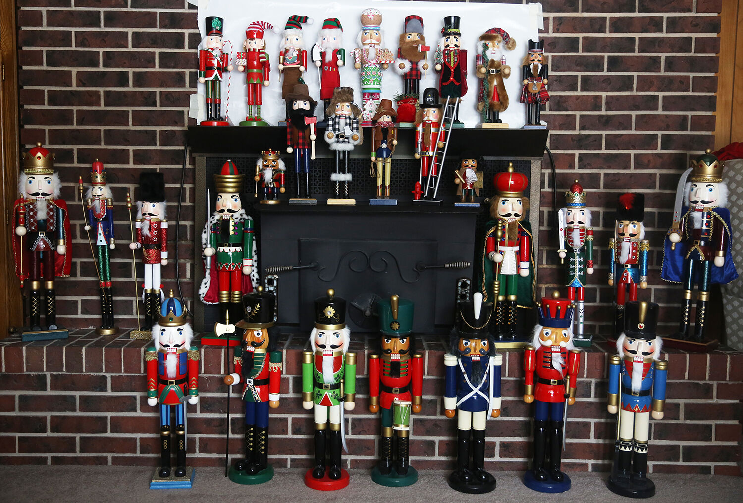 Forty two nutcrackers line the fireplace